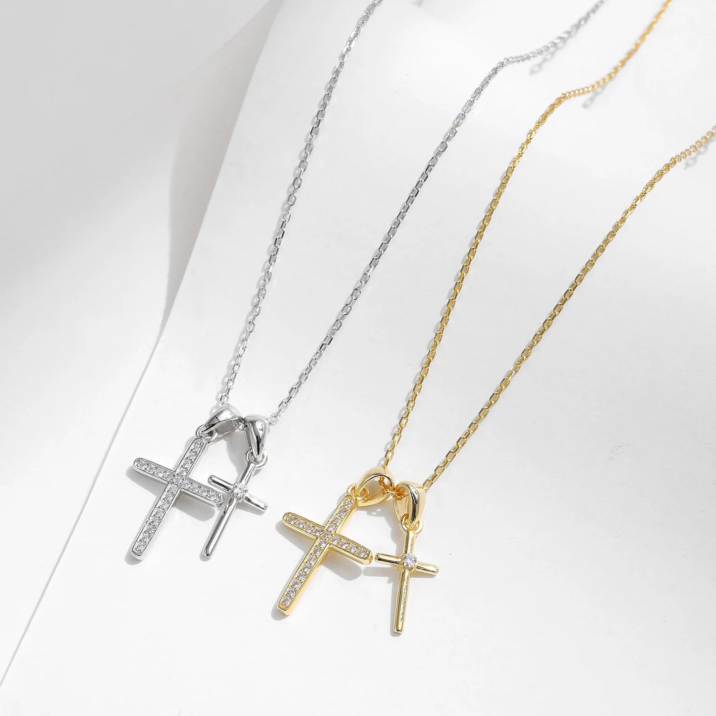Doppelte Kreuzkette in Gold & Silber