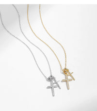 Doppelte Kreuzkette in Gold & Silber